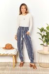 Double Take Geometric Print Tassel High-Rise Pants