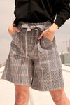 A Pair Of Wide Woven Plaid Shorts